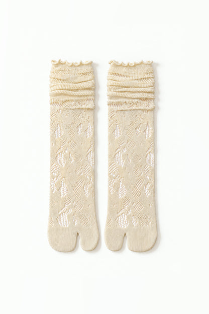 Tabi Lace Socks in beige, pair laid flat